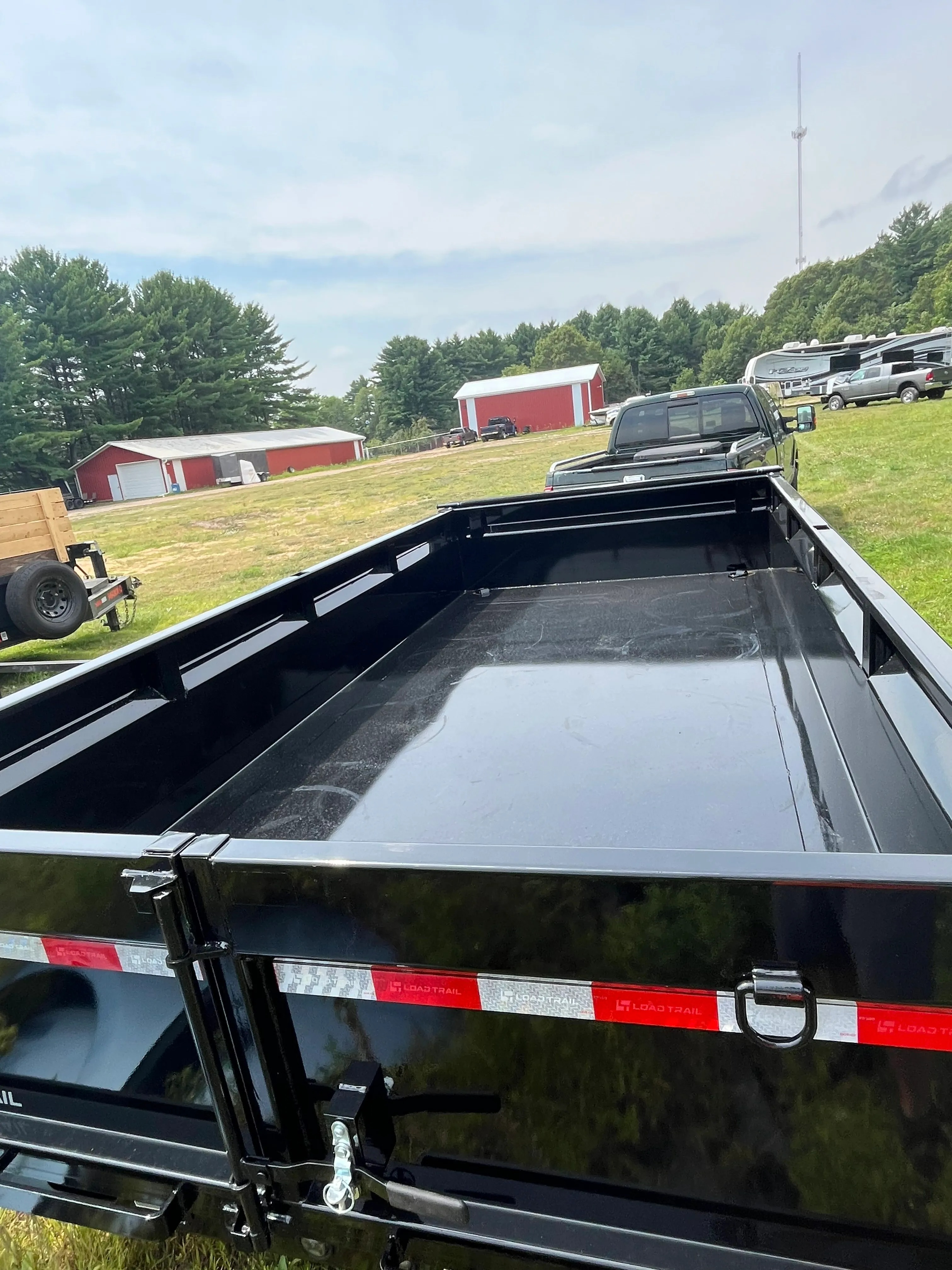 14' Dump Trailer 2' Sides rental photo 4 - Eau Claire WI trailer rental